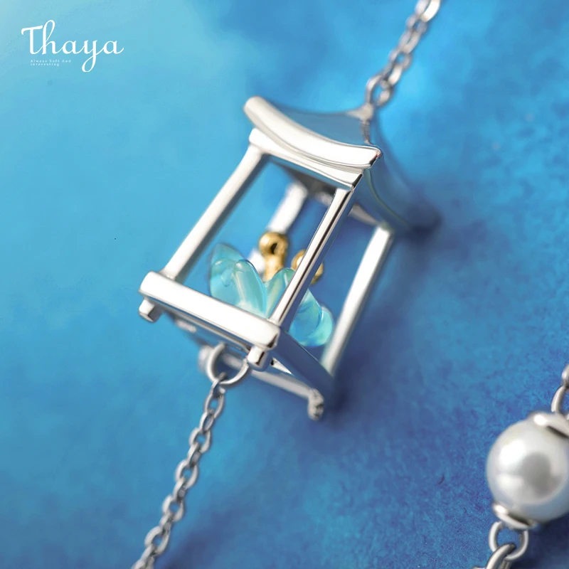 Женские серьги-гвоздики Thaya с зеленым кристаллом золотым фонариком необычные