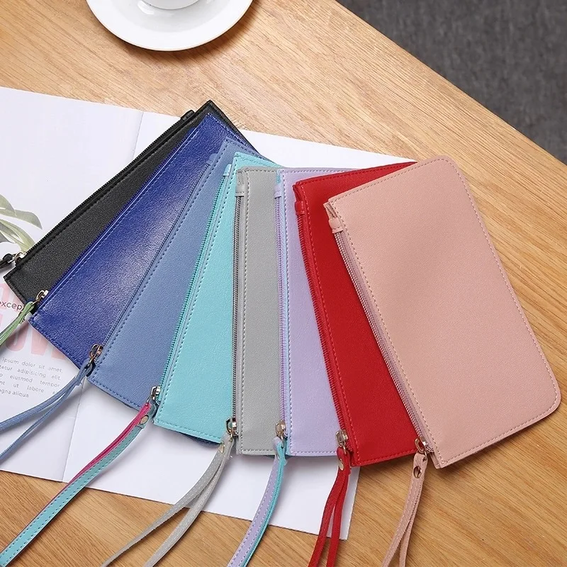 

Ladies handbag messenger bag casual handbag men and women hand key wallet DD33