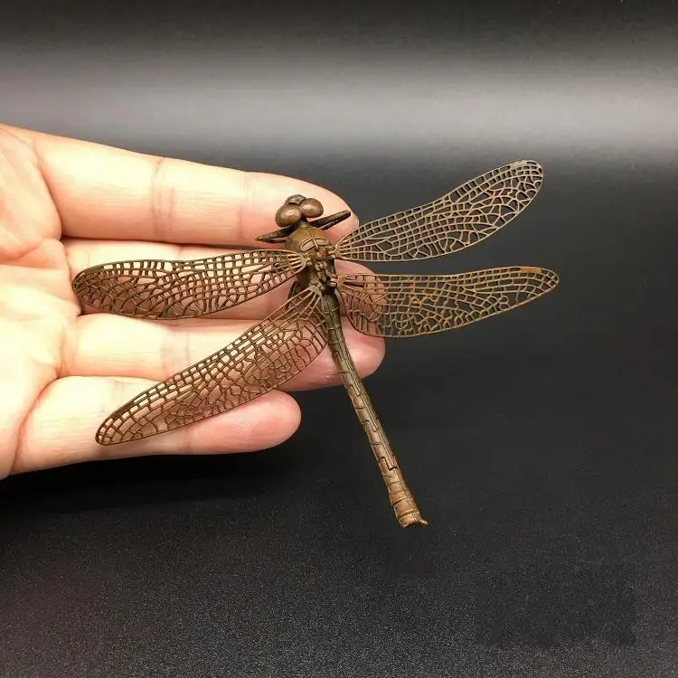 

Delicate and lovely (dragonfly) make old bronze figurines imitating antique