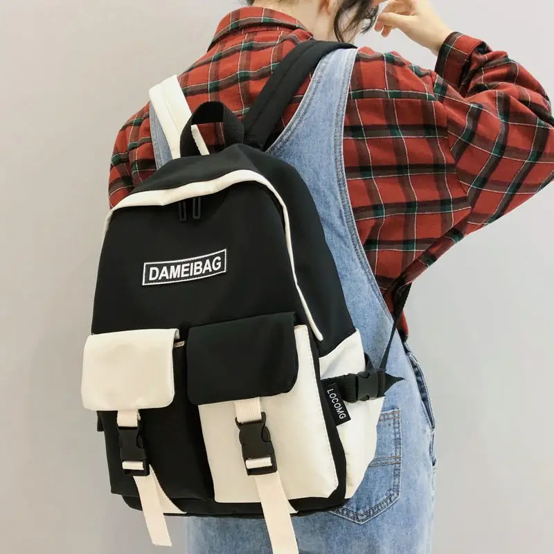 

New Panelled Waterproof nylon Women backpack Female eye-splice schoolbag for Teenage girls Double front pocket Mochilas S2312