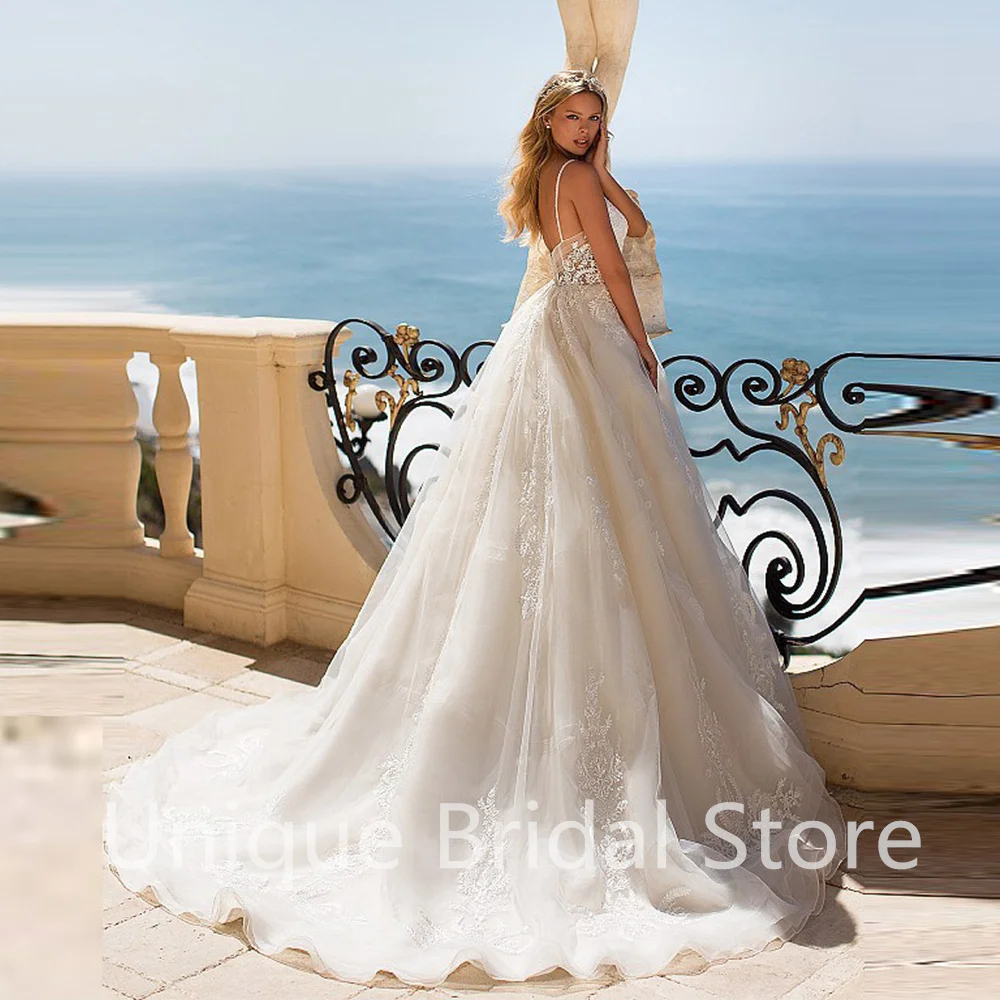 

Elegant Lace Wedding Dress A-Line V-Neck Spaghetti Straps Backless Appliqued Court Train Bridal Gowns 2021 Vestidos De Noivas