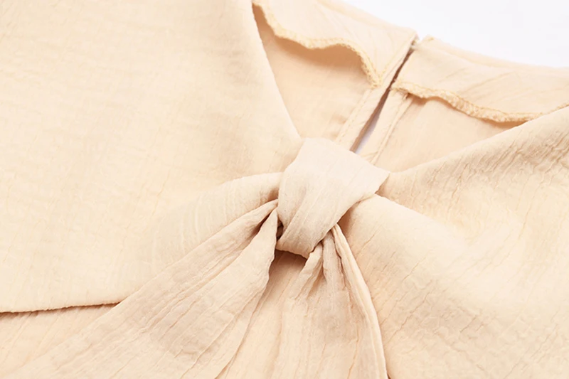 

[EAM] Women Casual Apricot Bandage Bow T-shirt New Peter Pan Collar Long Sleeve Fashion Tide Spring Autumn 2021 1DD5890