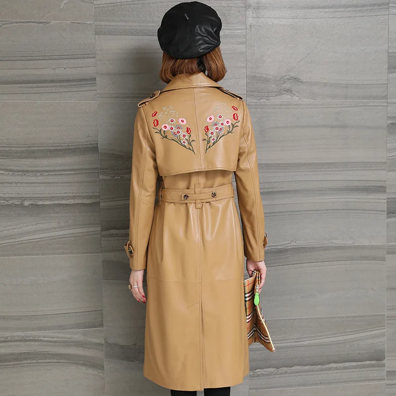 Chaqueta rompevientos larga bordada de piel de oveja para mujer, Abrigos de moda fina de cuero genuino con fajas, Otoño e Invierno