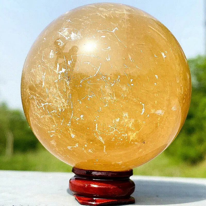 

Yellow natural topaz calcite quartz crystal ball healing gem