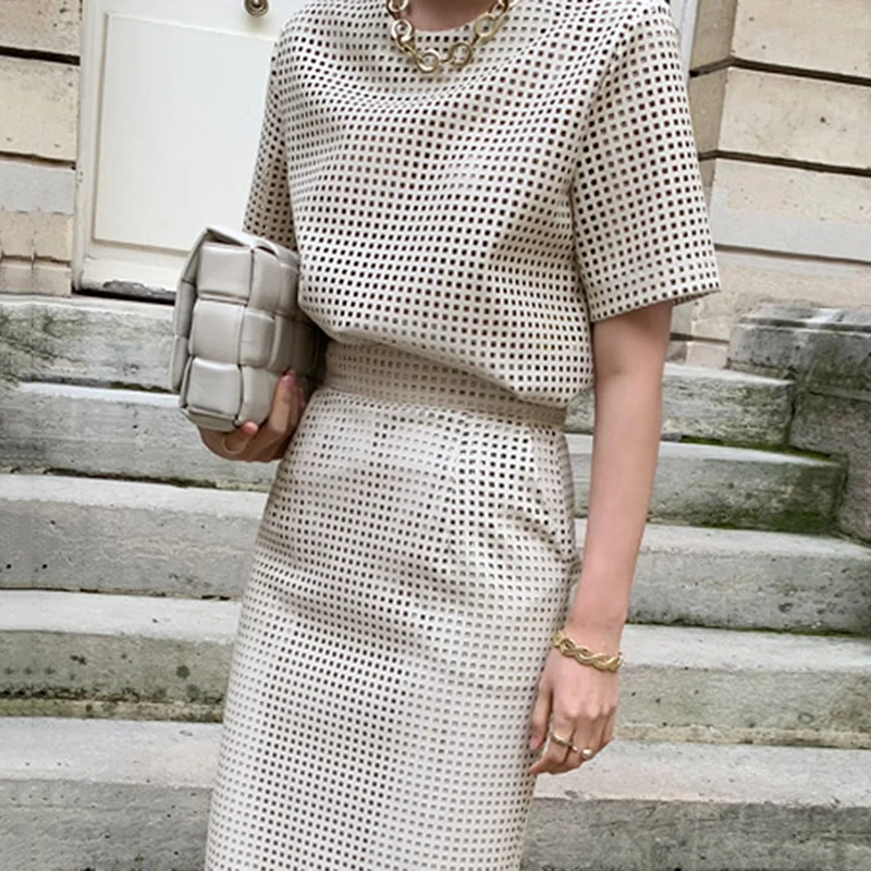 

Женский офисный костюм из двух предметов, корейский стиль, сетчатая кожаная ажурная юбка с коротким рукавом и длинная юбка с высокой талией,...