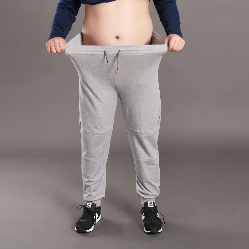 

Men Big Size Solid Sweatpants Spring Elastic Narrow Feet Stretch Pants Loose Plus Size Casual Cotton Jogger Trousers 5XL 6XL 7XL