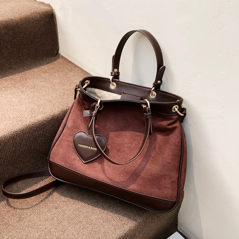 

Winter Matte Women Leather Bag Luxury Designer Handbag 2021 Large Capacity Solid Color Bucket Bag Heart-shaped Pendant Bag Bolsa