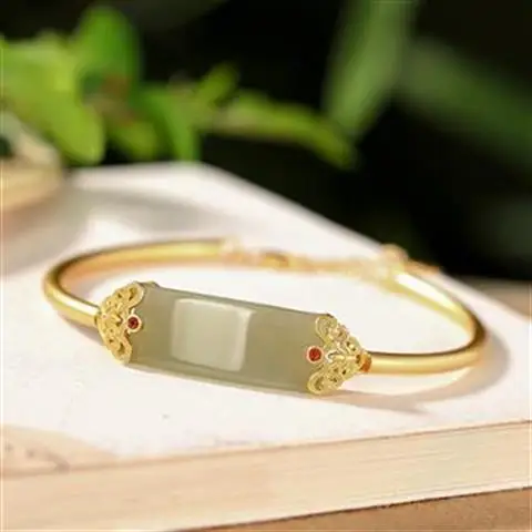 

Designer original new ancient gold craftsmanship inlaid hollow pattern natural Hetian jade bracelet elegant charm ladies jewelry