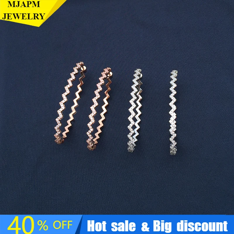 

Женские серьги-волны из серебра 925 пробы с фианитом