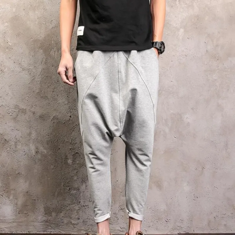 Мужские хлопковые спортивные штаны свободные однотонные шаровары с эластичной