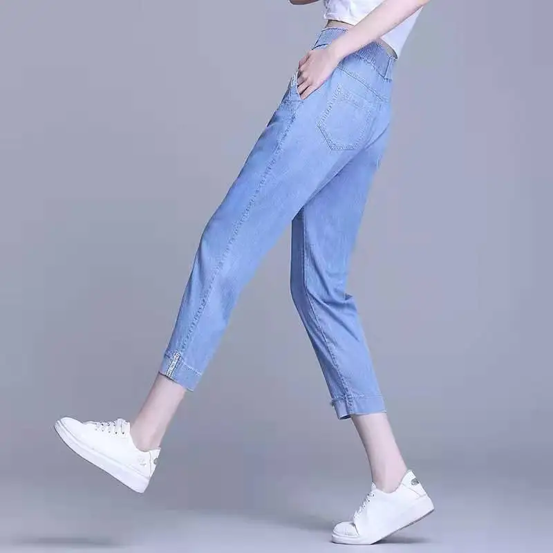 

Summer 2021 women's new high-waisted 7-minute casual Korean version of elastic belt jeans loose thin Haren pants