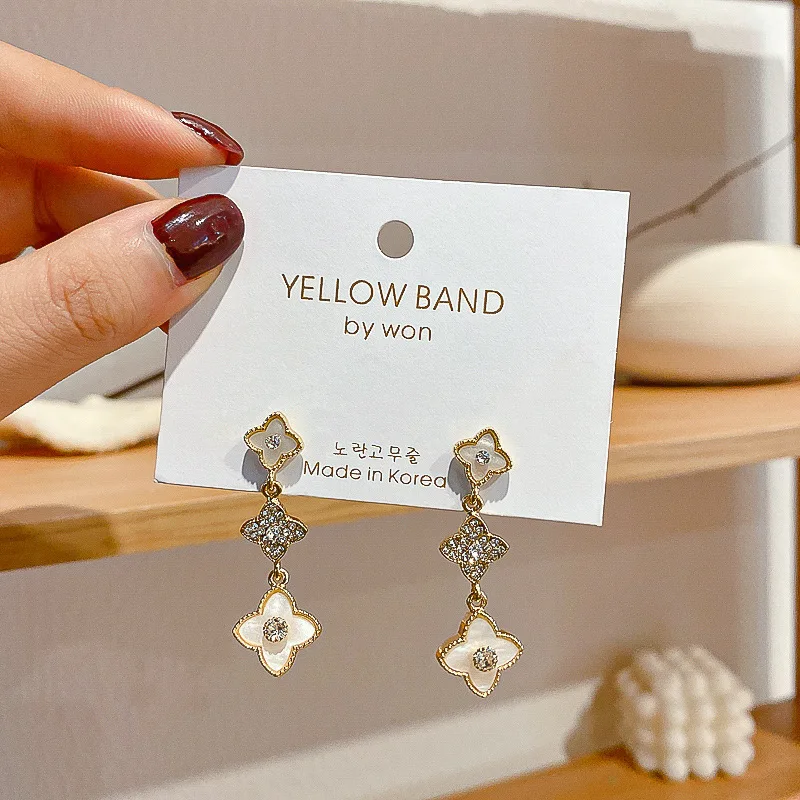 

fashion simple personality exquisite fourclover S925 silver needle earrings super flash set diamond temperament female earrings