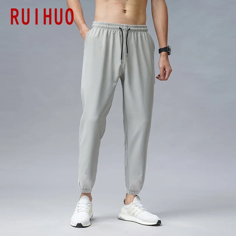 

RUIHUO 2021 New Ankle-Length Pants Men Trousers Joggers Casual Pants Men Sweatpants Hip Hop Streetwear Male Plus Size M-5XL