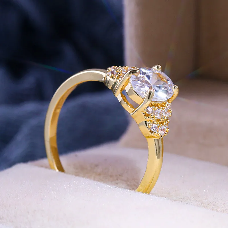 Роскошное женское кольцо с овальным цирконом модное обручальное желтого и