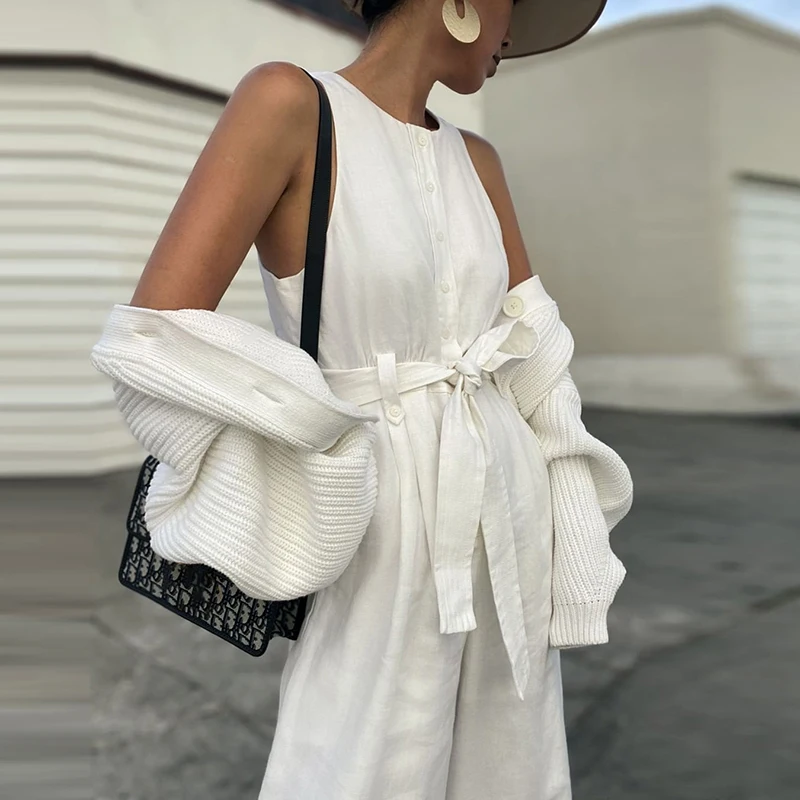 

Sexy Casual Button Sashes Sleeveless White Jumpsuit Women FashionO-Neck Long Boot Cut Jumpsuit Slim Fit 2020 New Arrival