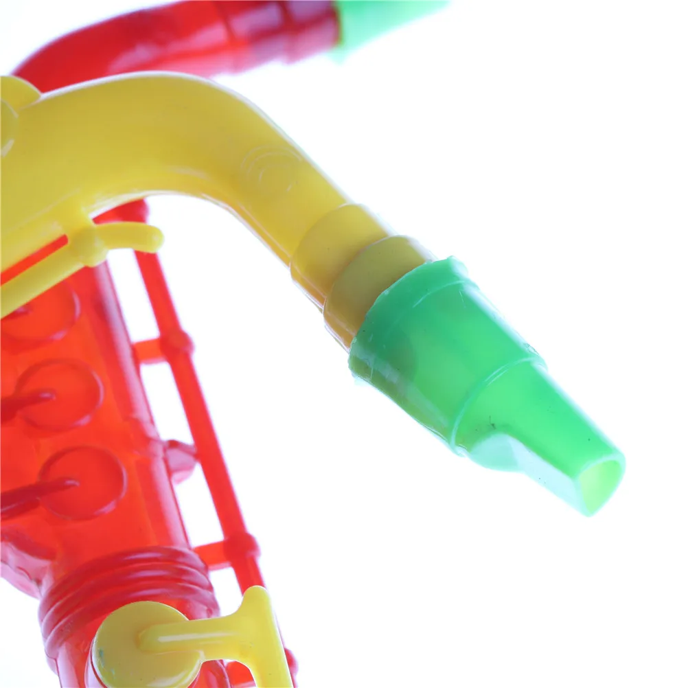 

1Pcs 21cm Plastic Musical Saxophone Instrument Plastic Baby Kids Musical Instrument Early Education Toys Random Color
