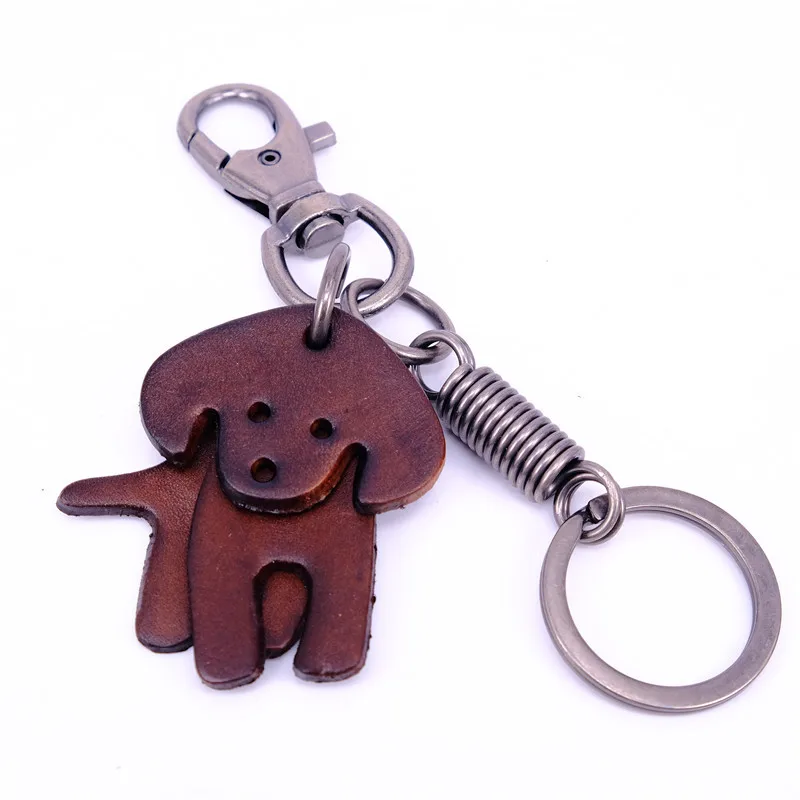 

Retro top layer vegetable tanned cowhide cute animal design key chain movable dog leather decoration car key chain pendant