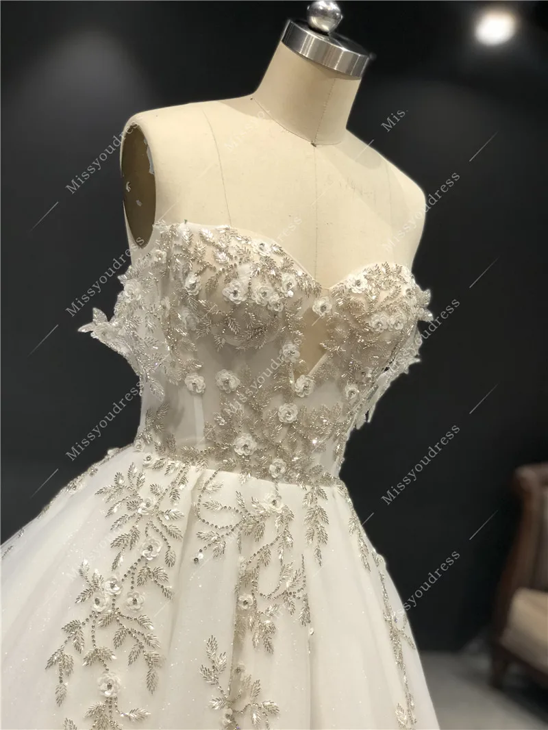 2021 Newest High Quality Real Sample Ivory Sweetheart Strapless A-line Heavy Silver Beadings Floor Length Wedding Dress