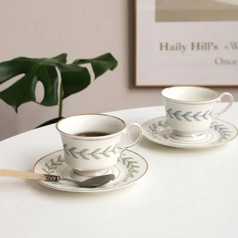 

Golden Edge Leaves Ceramics Mugs with Saucer coffee mug Milk Tea office Cups Drinkware the Best birthday Gift for Friends