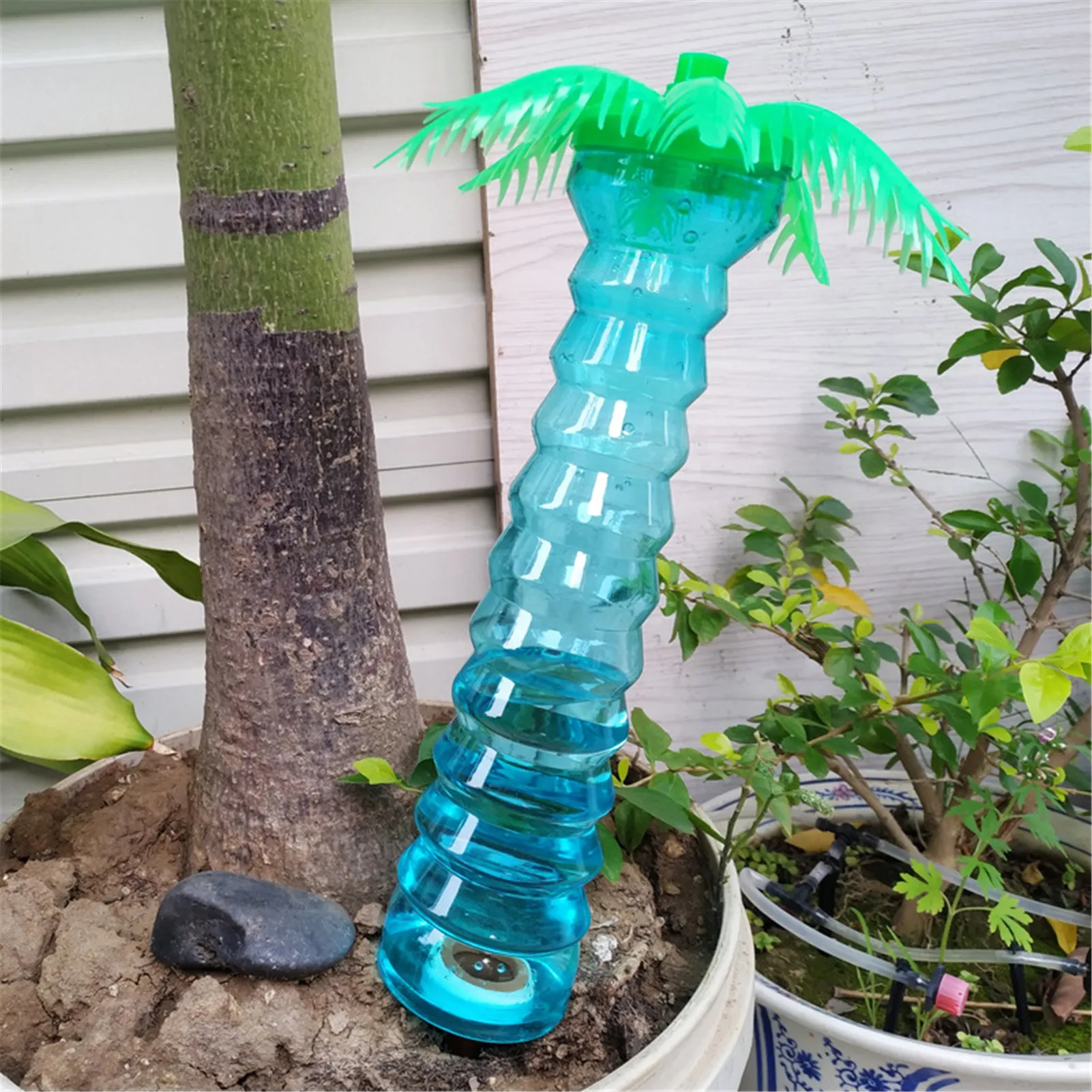 

Plant Self Watering Spike Coconut Tree Shaped Automatic Waterer Bonsai Automatic Water Seepage Device Small Drip Irrigation