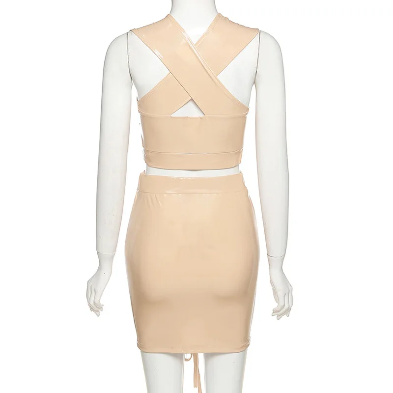 

2021 Summer Women's New Style Halter Backless Hollow Out Vest Pleated Package Hip Short Skirt Set Bright PU Slim Mini Skirt Suit
