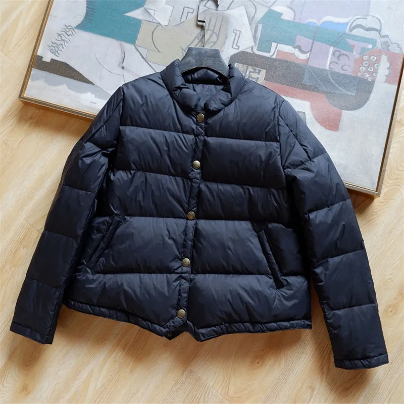 Женский короткий пуховик на утином пуху теплый тонкий осень и зиму светильник
