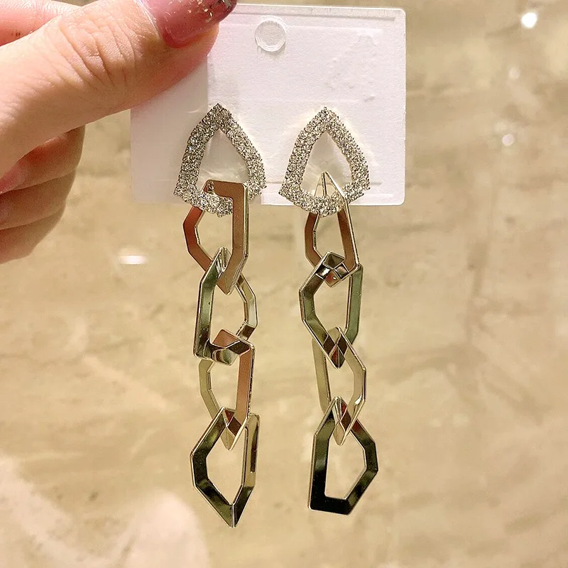 

European and American new metal chain tassel earrings S925 silver needle fashion geometric simple hollow diamond earrings