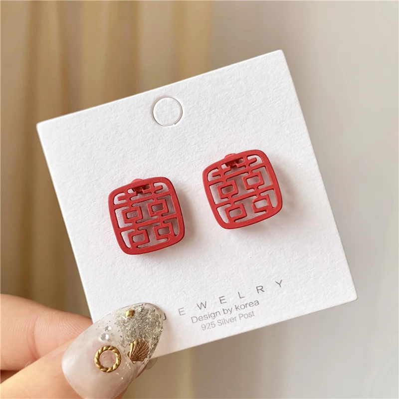 

Red Metal Stud Earrings Fashionable Joker Character Restoring Ancient Ways Women Jewelry Gift Accessories New Year .The Wedding