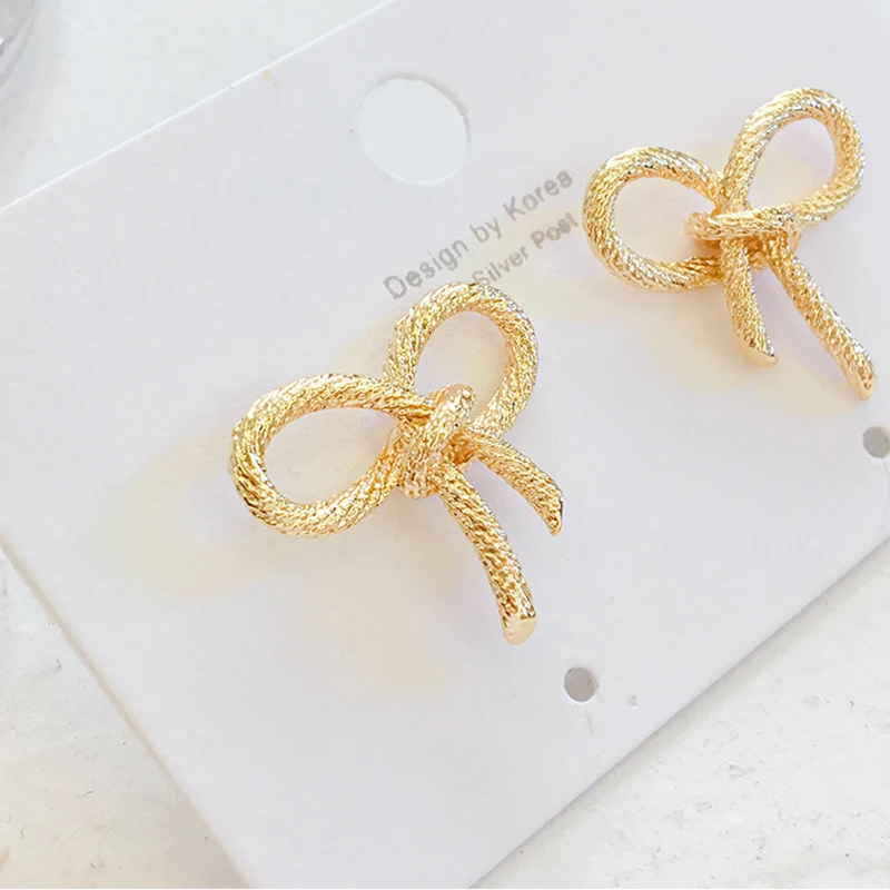 

Korean version of simple metal bow earrings temperament French earrings earrings Trend Tiny Ear Studs exquisite Jewelry Earrring