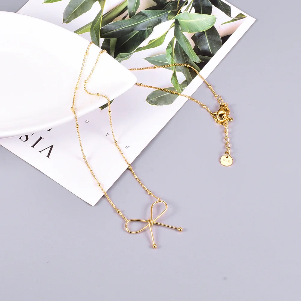 

Rhysong Brand New Statement Butterfly Necklace Stainless Steel Collars For Women Chain With Knot Pendant Gold Plated Jewelry