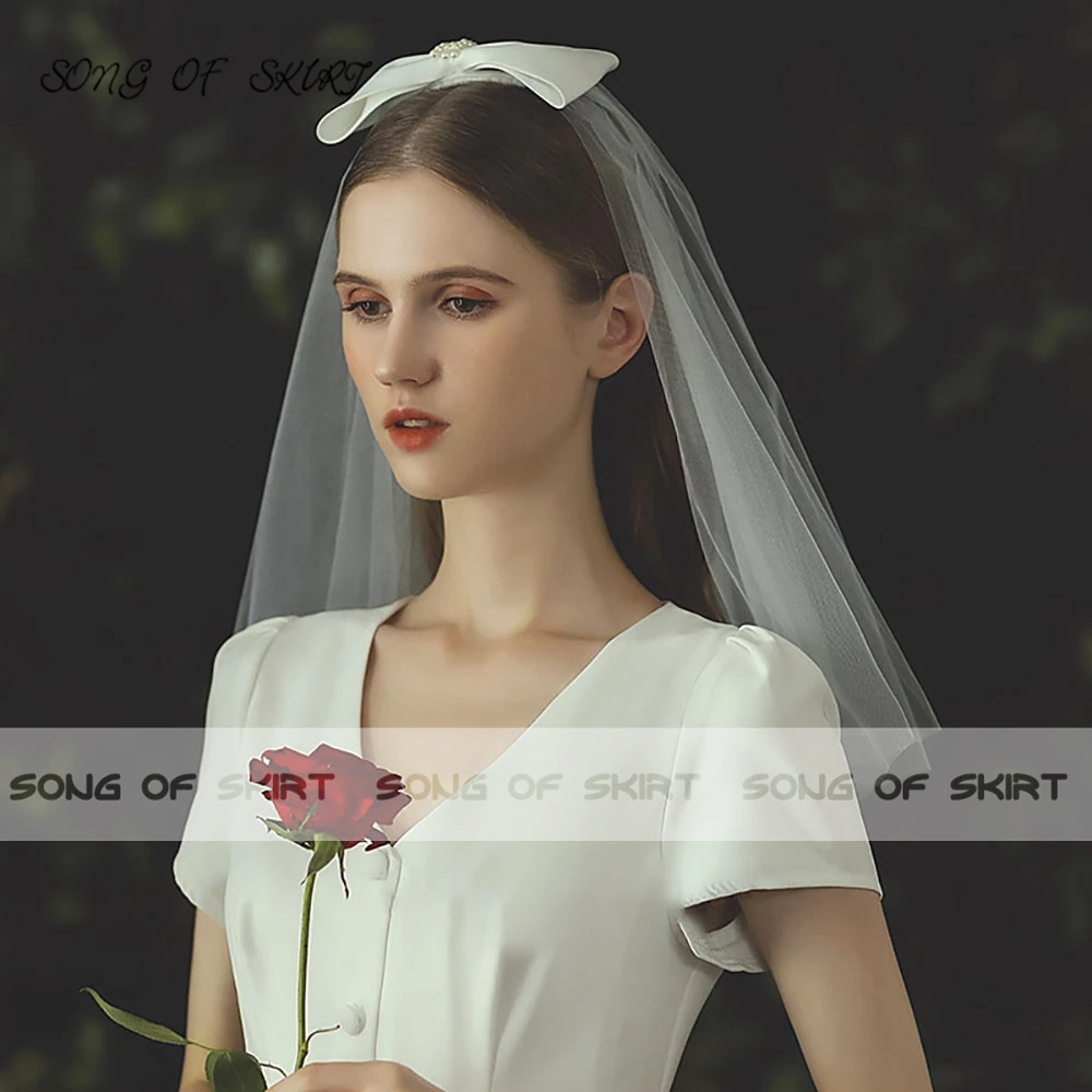 

Hot Selling Simplicity French Pure White Married Bridal Veil Bride Pearl Bow Shoulder Length Wedding Accessories Welos