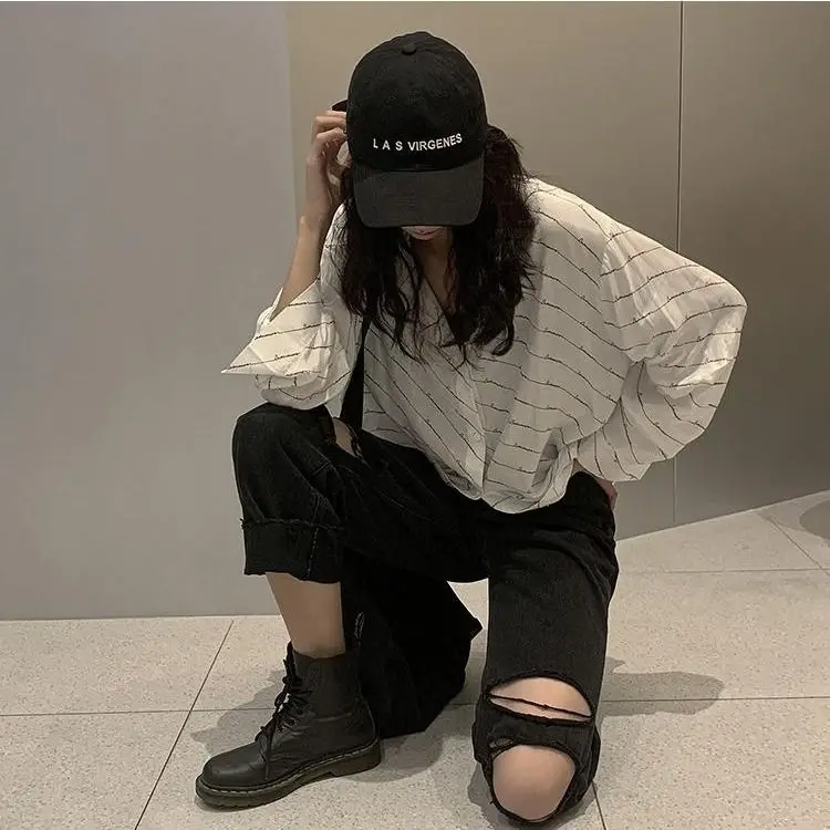 

Skinny big hole jeans female beggar autumn new Korean loose BF high waist straight leg wide leg Capris fashion