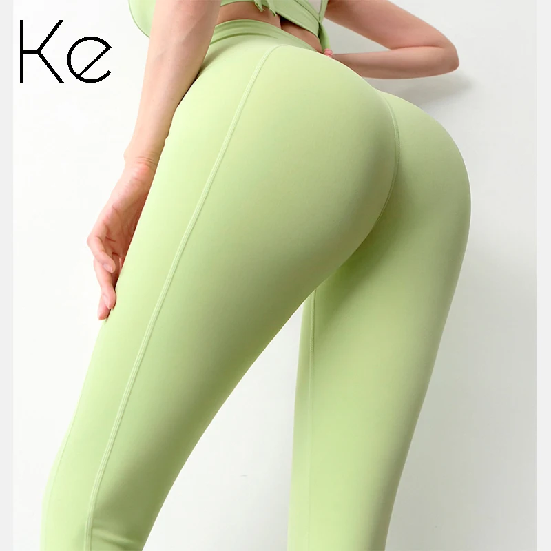 

KE no embarrassment line fitness pants women high waist tummy tight yoga pants running outside wearing peach sports pants
