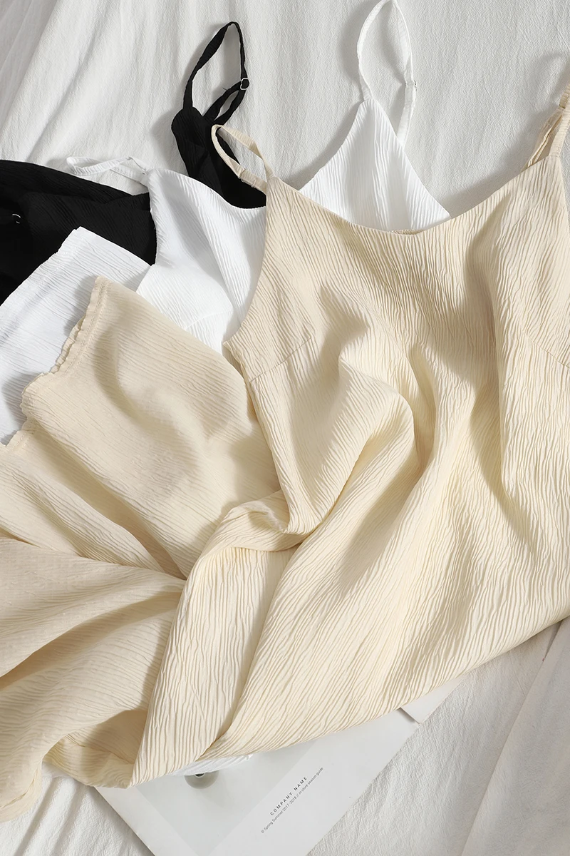 

Spring and summer new style and versatile pure color suspender skirt Korean base skirt shows thin cover one step skirt crumpled