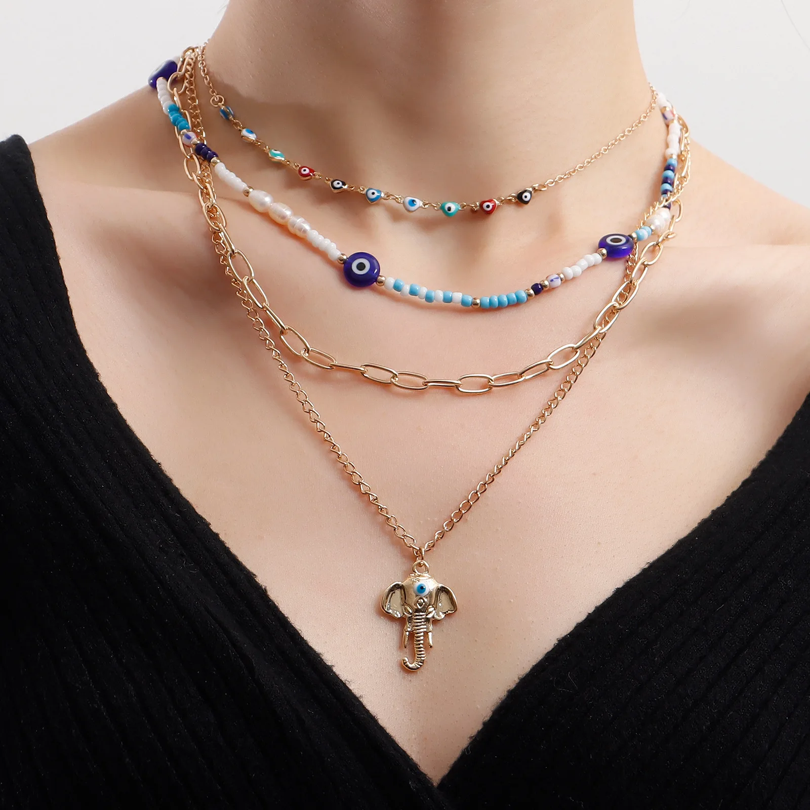 

Beautiful Multi-layer Heart-shaped Devil's Eye Elephant Nose Rice Bead Necklace Women's Fashion Necklace In The Streets of Simia