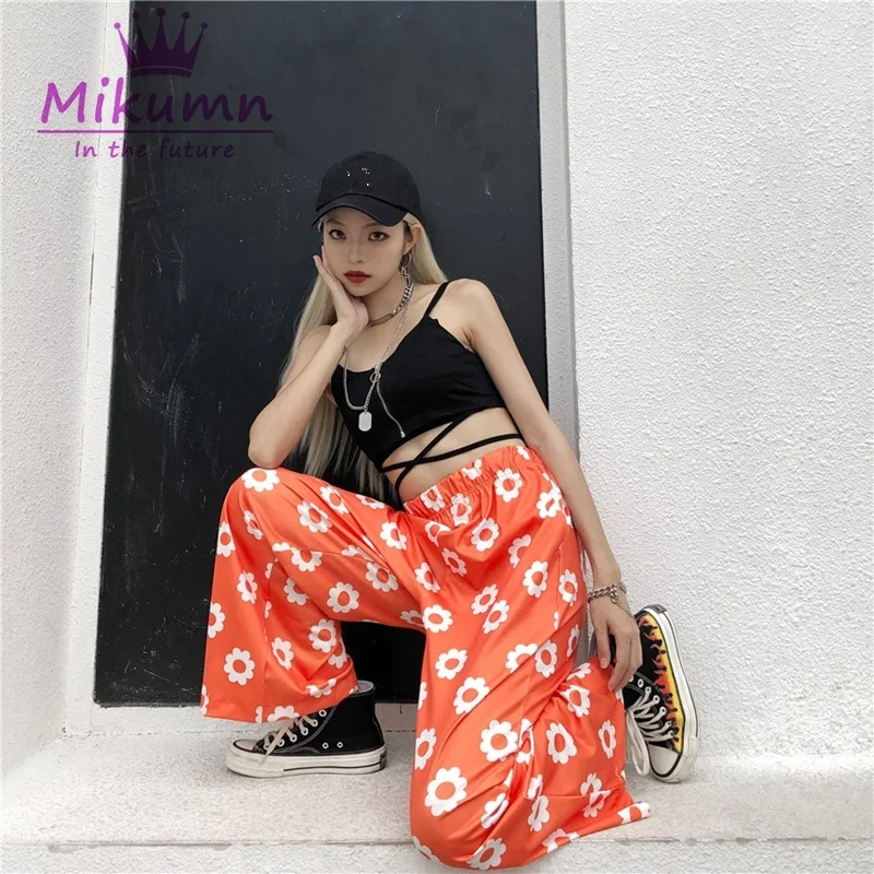 Женские свободные брюки с цветочным принтом оранжевые черные синие прямые