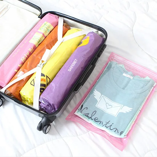 

Creative Hand Roll Compression Storage Bag Travel Clothes Vacuum Compression Bag 30 * 45cm Portable Hand Pressure Ditty Bag