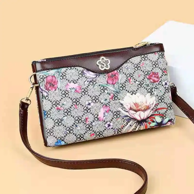 

Handbag women 2021 new fashion large capacity multi-layer mobile phone zero wallet long fashion temperament mother's handbag