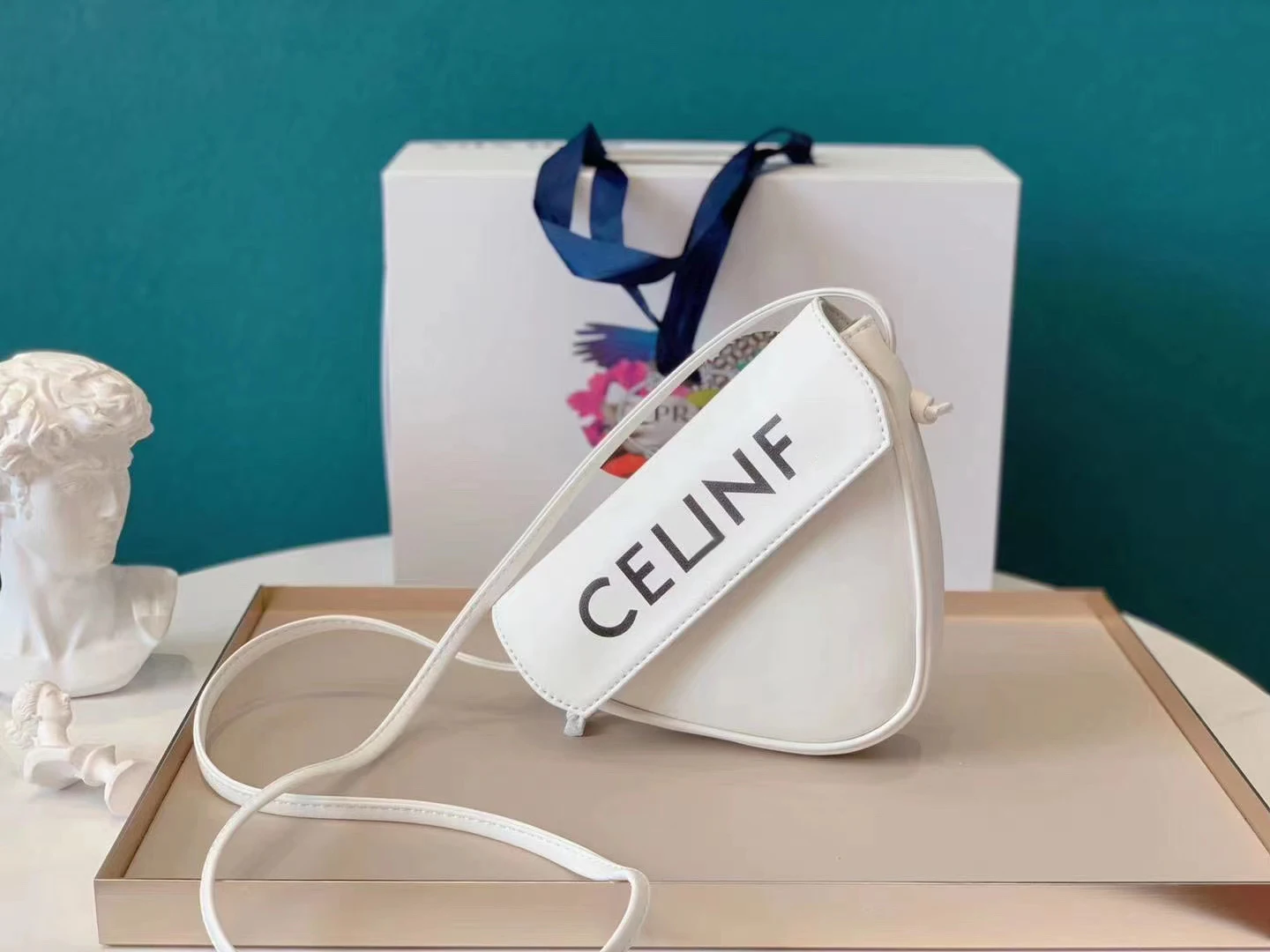 

2021 spring and summer new triangle bag female soft cute underarm bag shoulder messenger simple and fashionable small