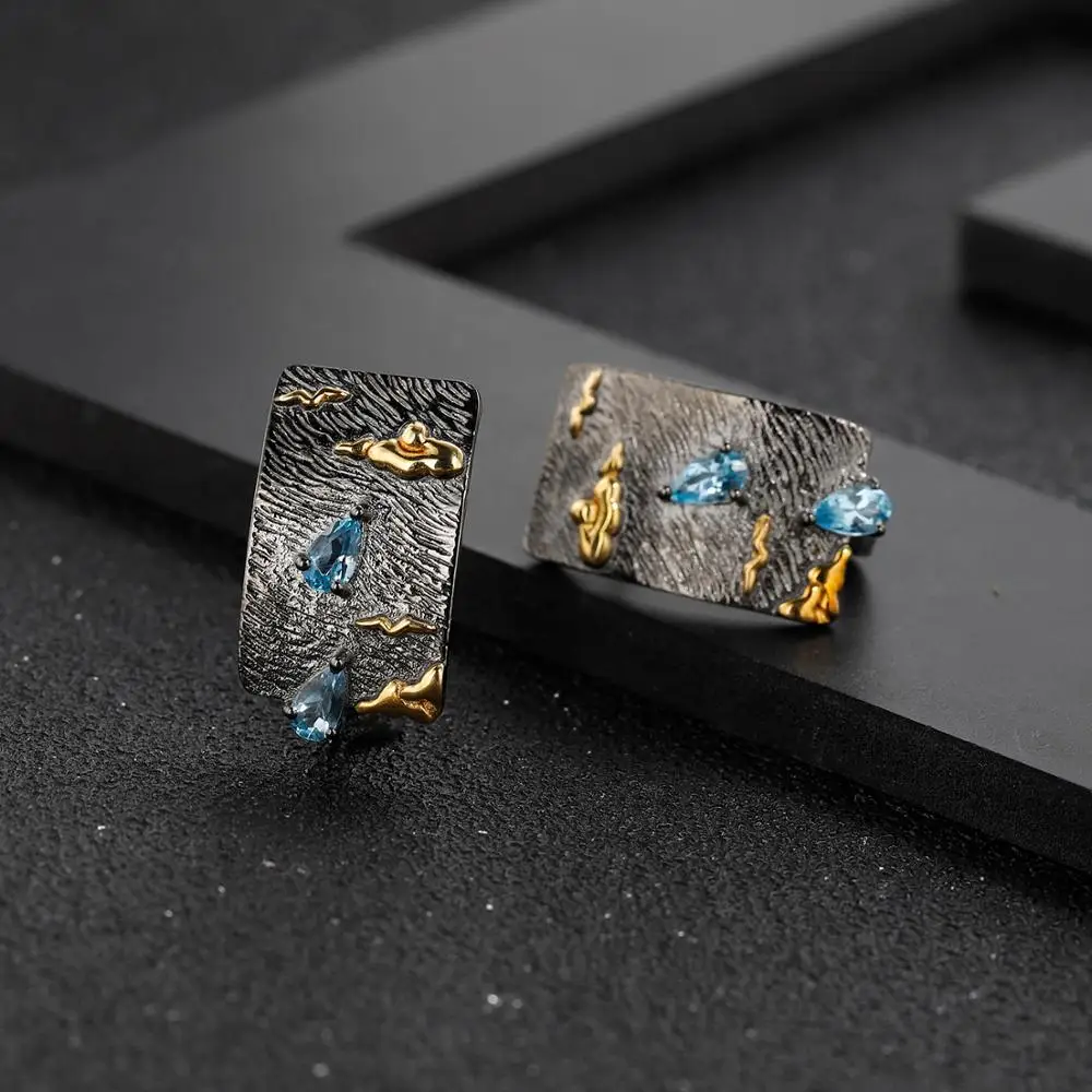 Серьги-клипсы женские из серебра 925 пробы с натуральным голубым топазом |