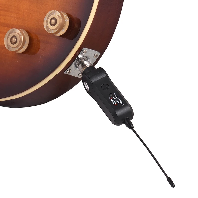 

AROMA ARU-03 UHF Wireless o Transmission System Transmitter Receiver Built-In Rechargeable for Guitar