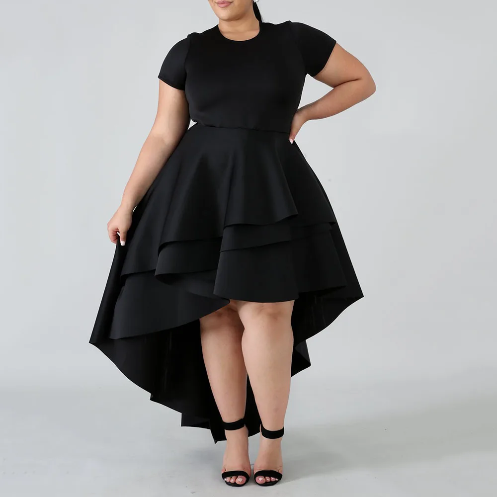 Женское платье большого размера розовое асимметричное с низким слоем оборками