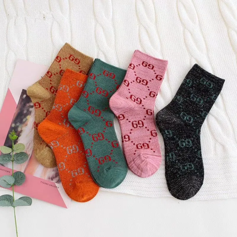 

Five pairs of men and women general new spring and summer fashion breathable multicolor letters cotton socks