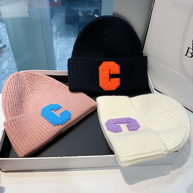 

2021 New winter fashion letters woolen hats autumn winter couples Baotou hat beanie hat for men