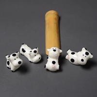 ceramic cheap cat chopstick shelf super budding cute dairy cow chopstick holder