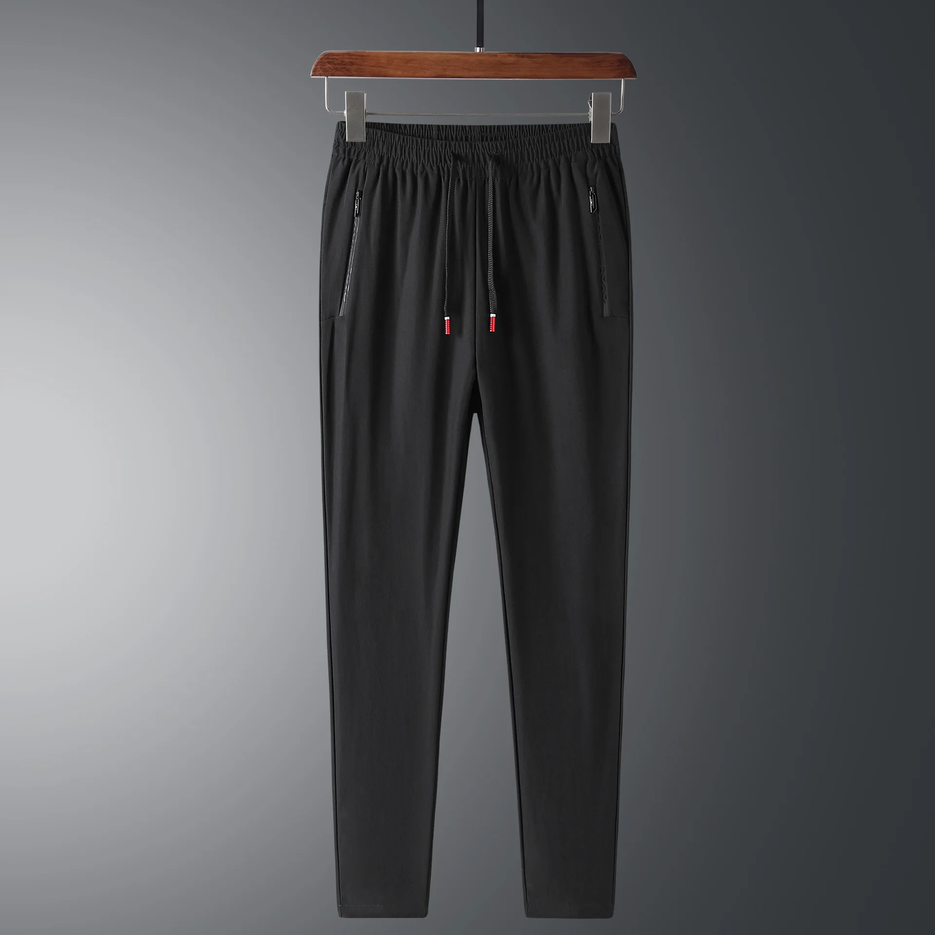 

Summer thin ice silk casual pants men's trousers with elastic and slim legs men's loose and quick drying sports pants 2021