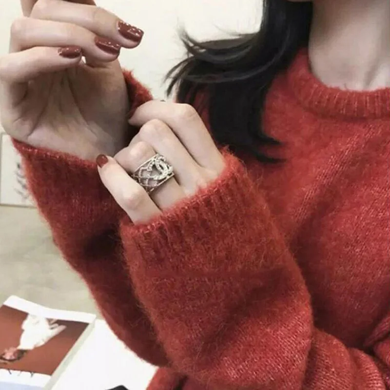 

Autumn and winter women's sweater casual solid color round neck long sleeve loose sweater