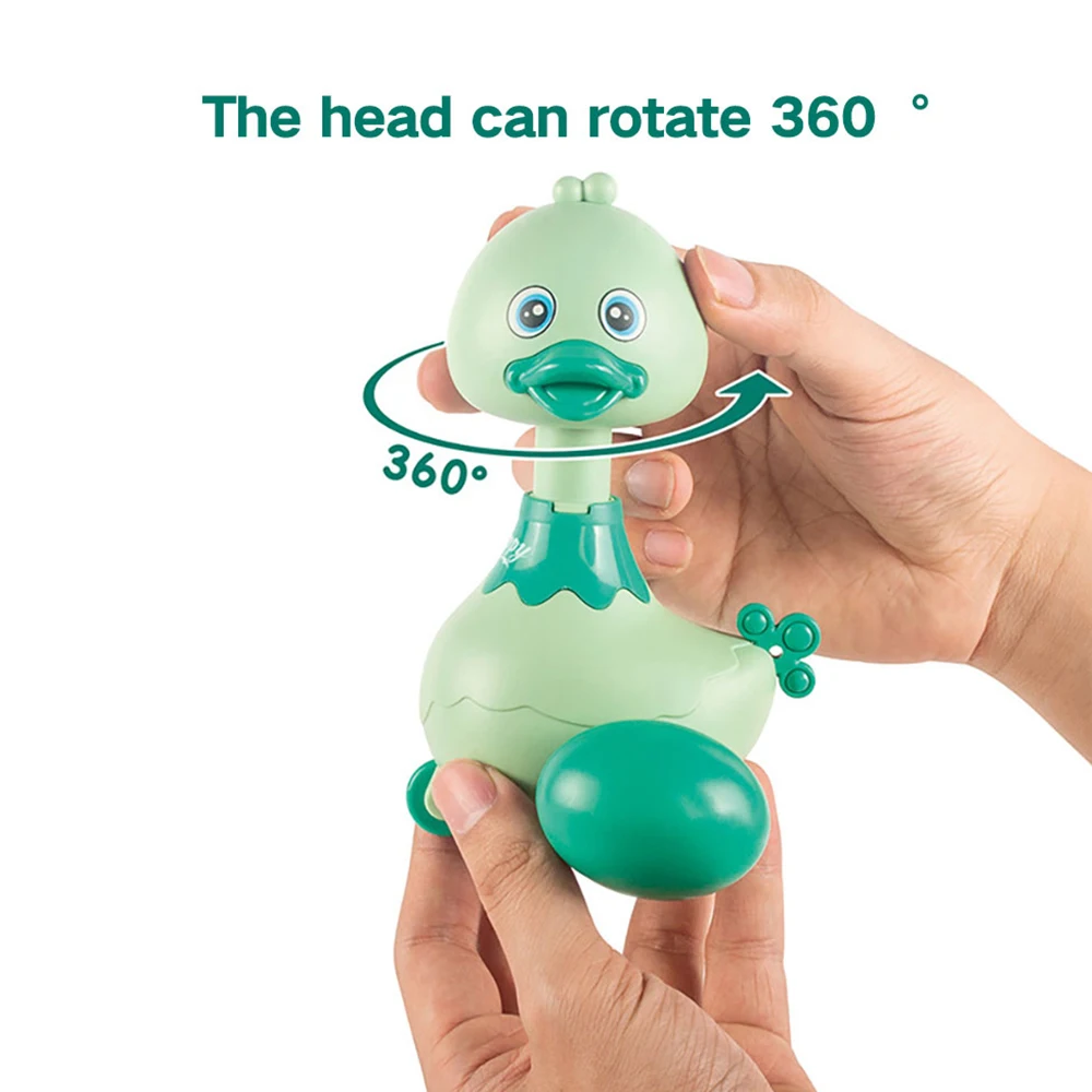 

Funny Cartoon Duck Child Press Inertial Toys Head 360° Turn Around Shaking Ring Bells Kids Infant Crawling Gifts