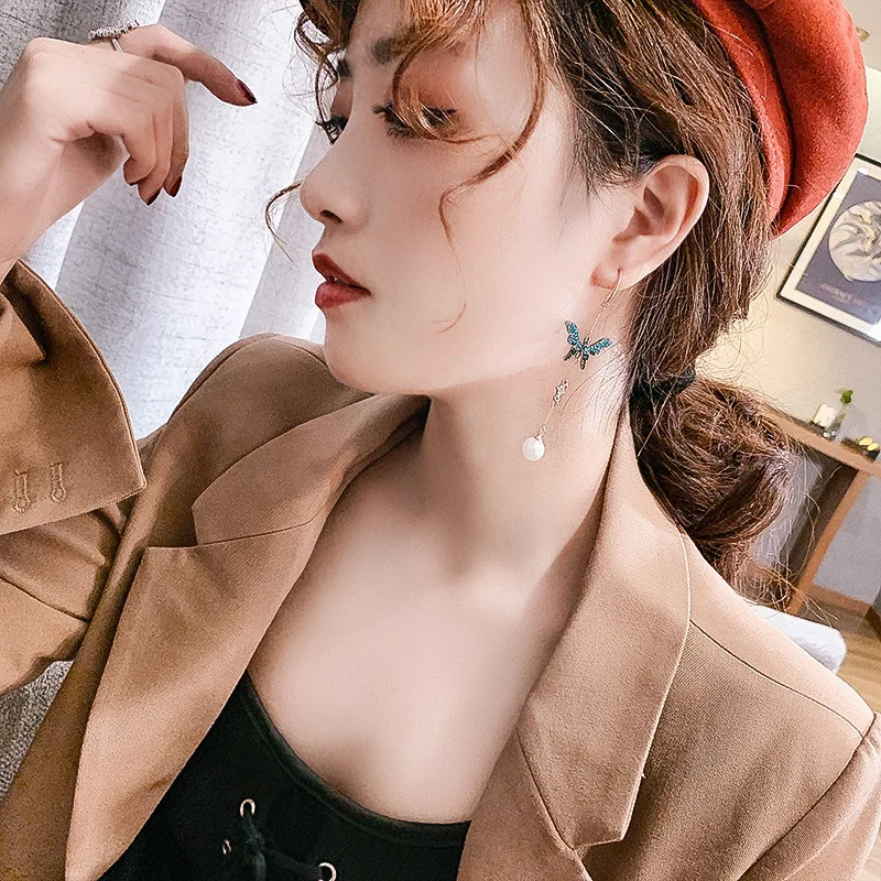 

Korean Fashion Fairy Butterfly Pearl Dangle Earrings For Women Girl Wild Long Rhinestone Tassel Earrings Brincos Jewelry Net Ret