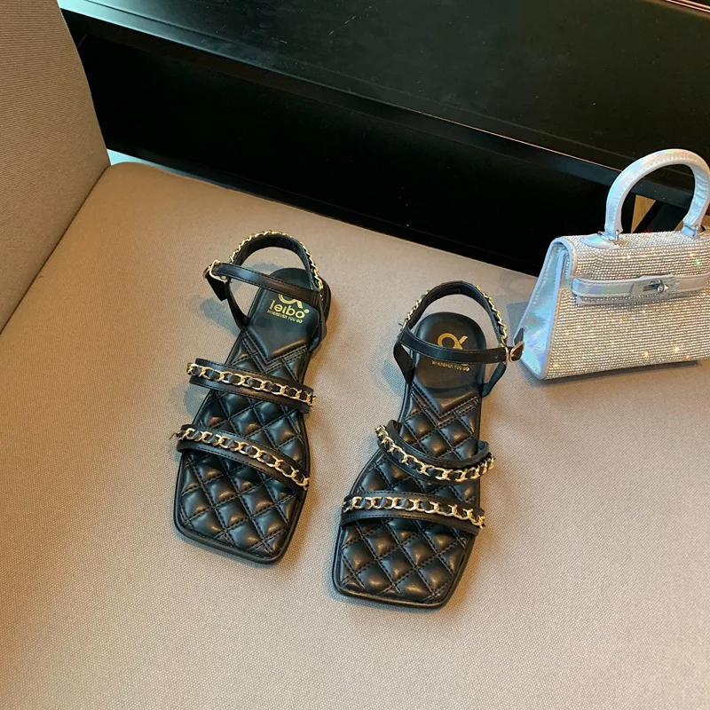 

Summer new style fairy style word buckle open toe sandals female metal chain flat Roman sandals